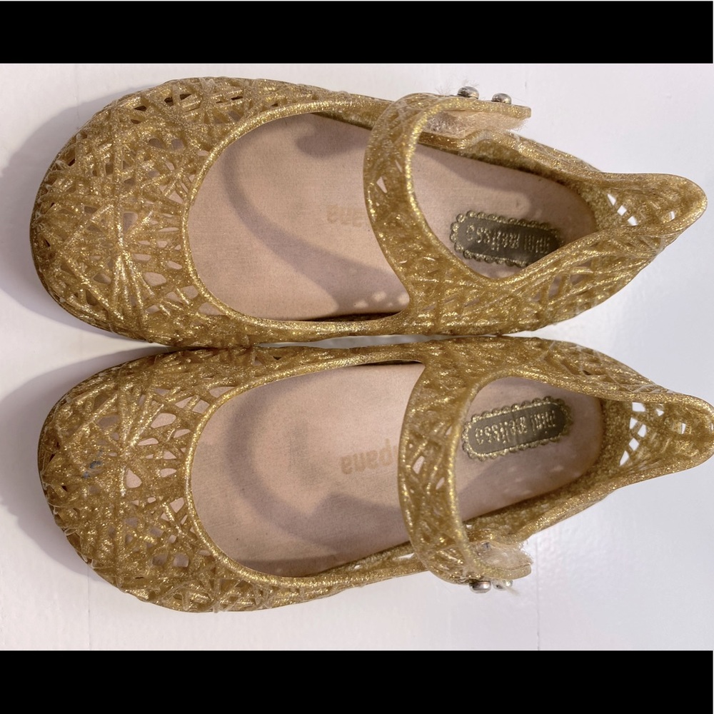 Size 7 gold mini Melissa shoes